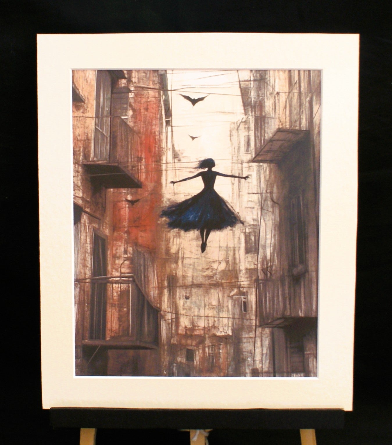 City Dancer — limited edition giclee print, gothic ballerina floating between city buildings, 255x305mm