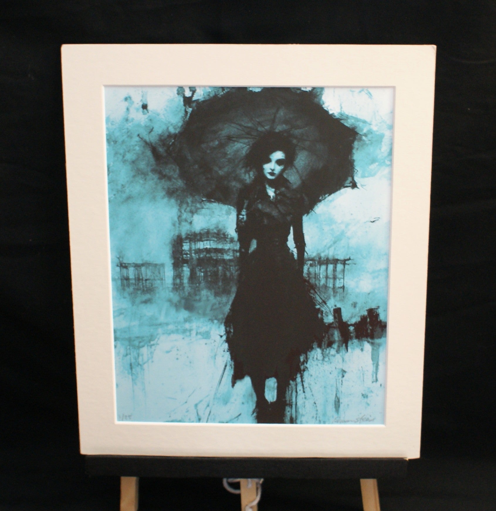 The Parasol — limited edition giclée print, gothic woman with parasol before Brighton West Pier in deep teal, 255x305mm