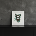 Demonic portrait print on black sideboard with dark grey wall