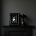 Square format framed artwork on mantle